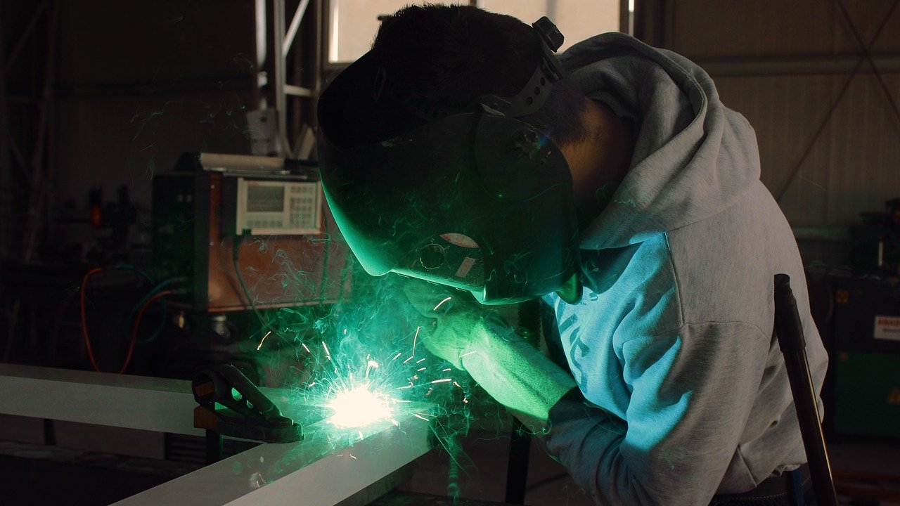 Stock image of man welding