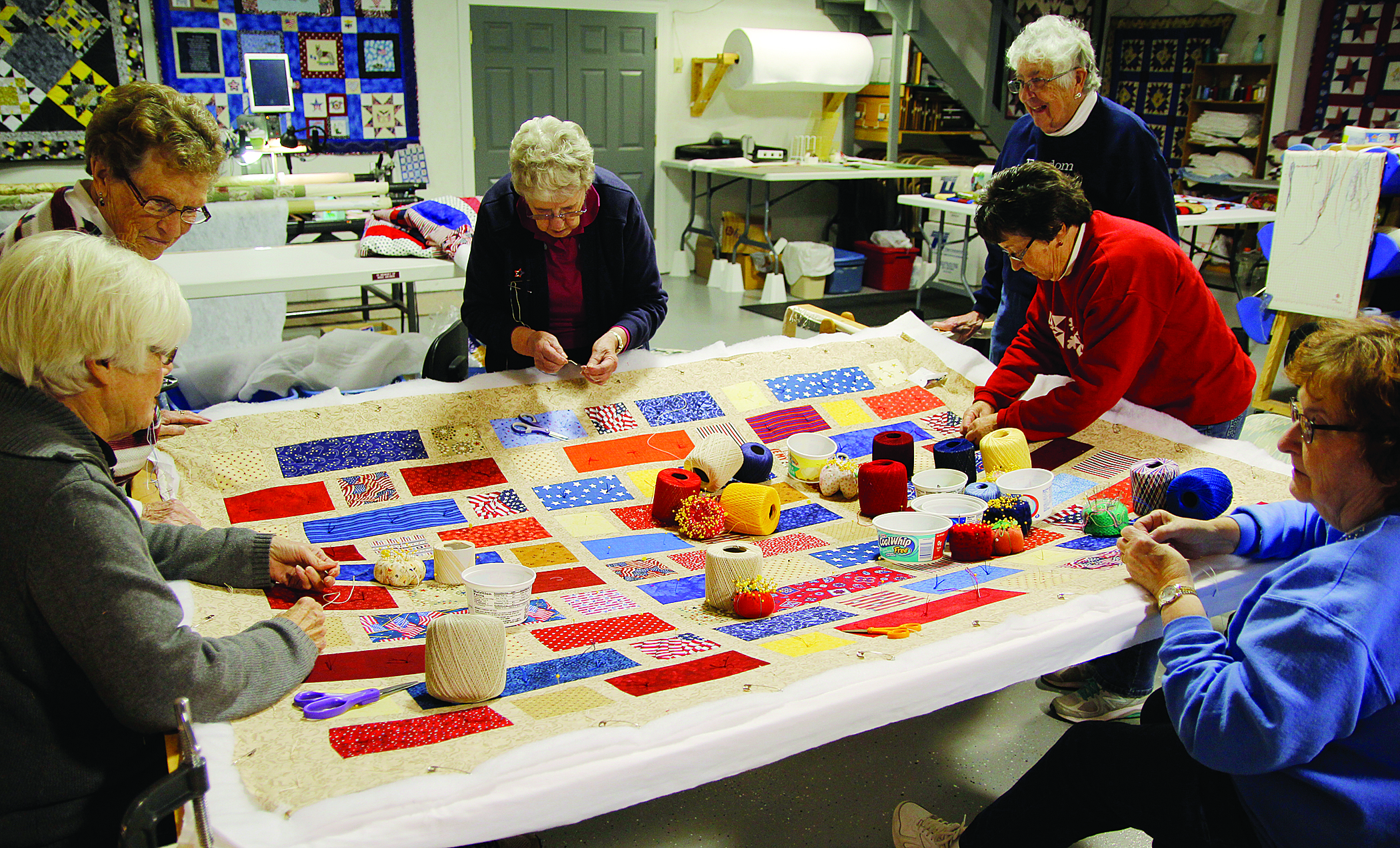 Volunteers working on a quilt at Freedom Quilts near Varina