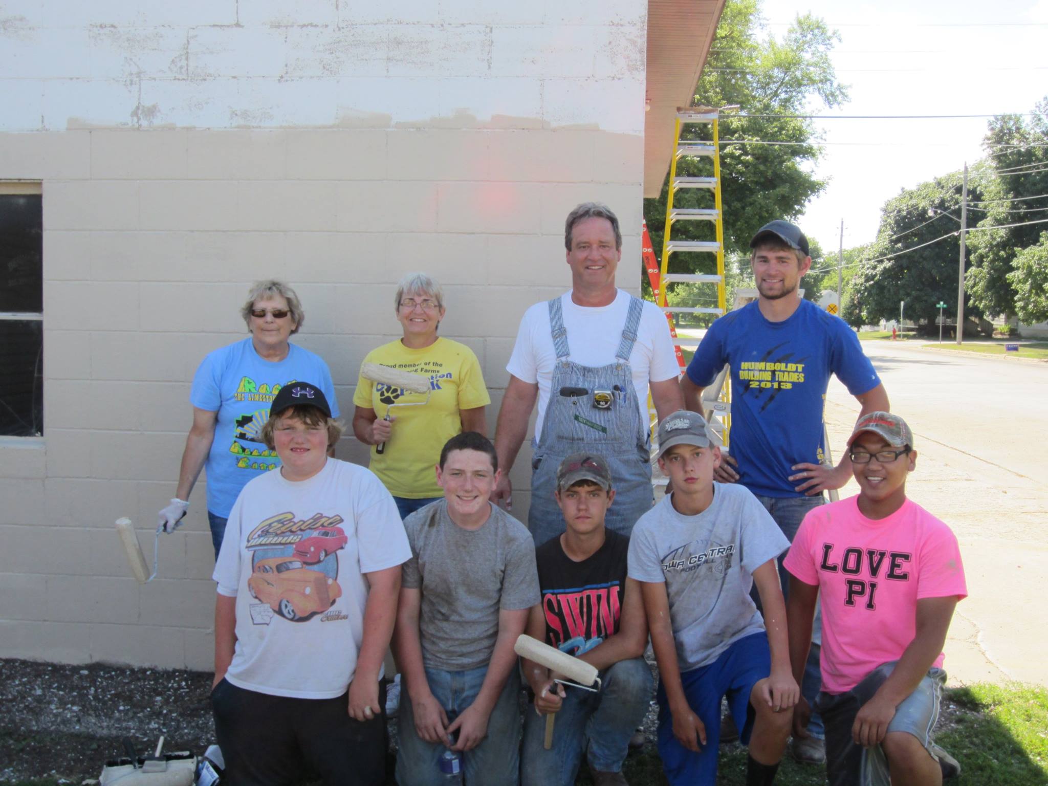 Gilmore City Hometown Pride volunteers working on Paint Iowa Beautiful grant project